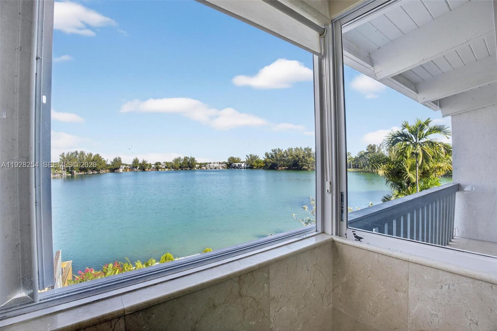 7043 Southwest 53rd Lane Miami, FL 33155 - Photo 22 of 41 a view of a lake from a balcony
