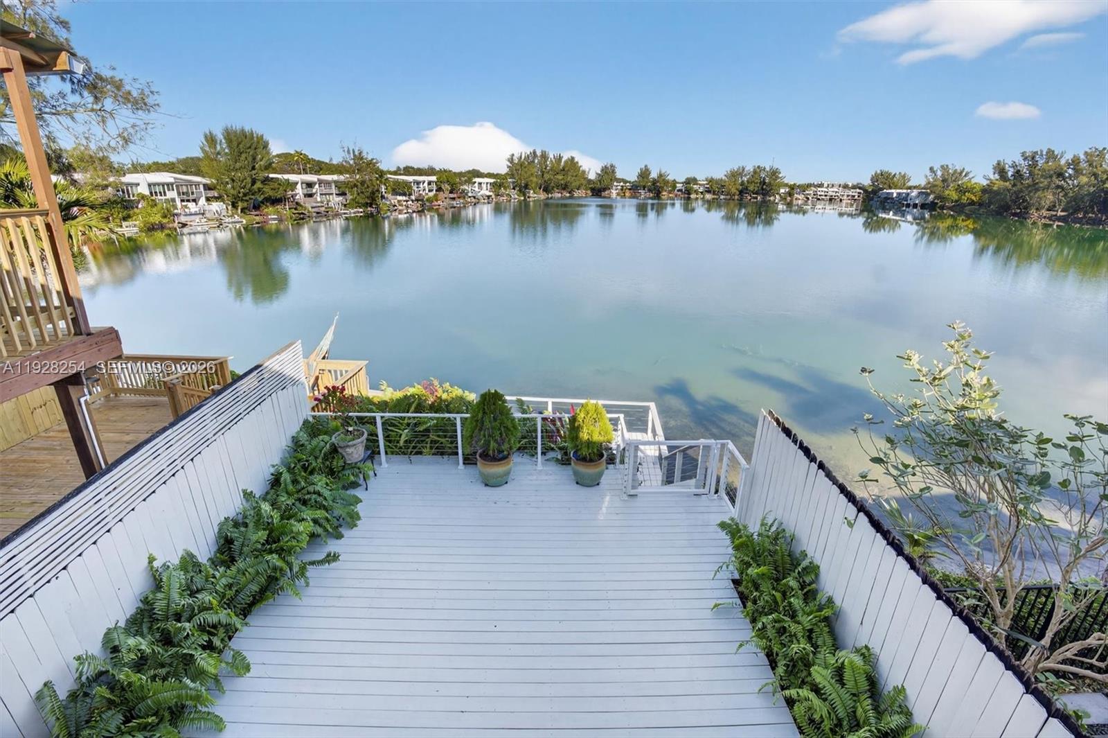 7043 Southwest 53rd Lane Miami, FL 33155 - Photo 24 of 41 a view of a lake with outdoor seating space