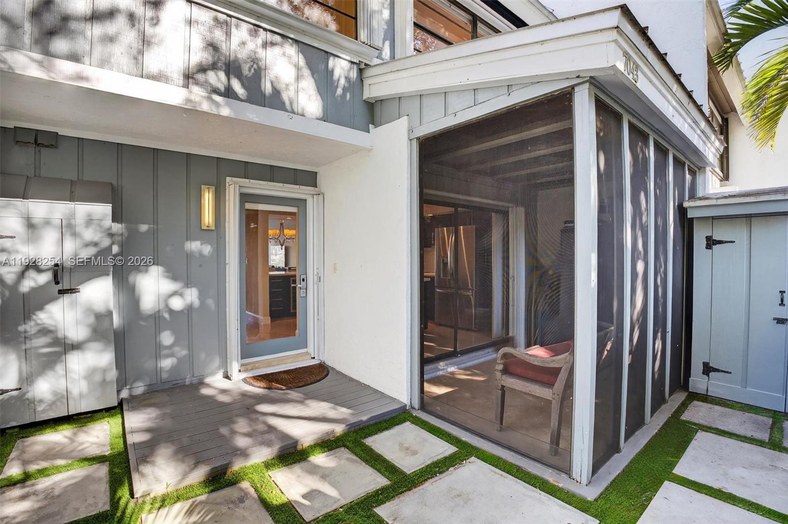 7043 Southwest 53rd Lane Miami, FL 33155 - Photo 32 of 41 a view of a room that has a door