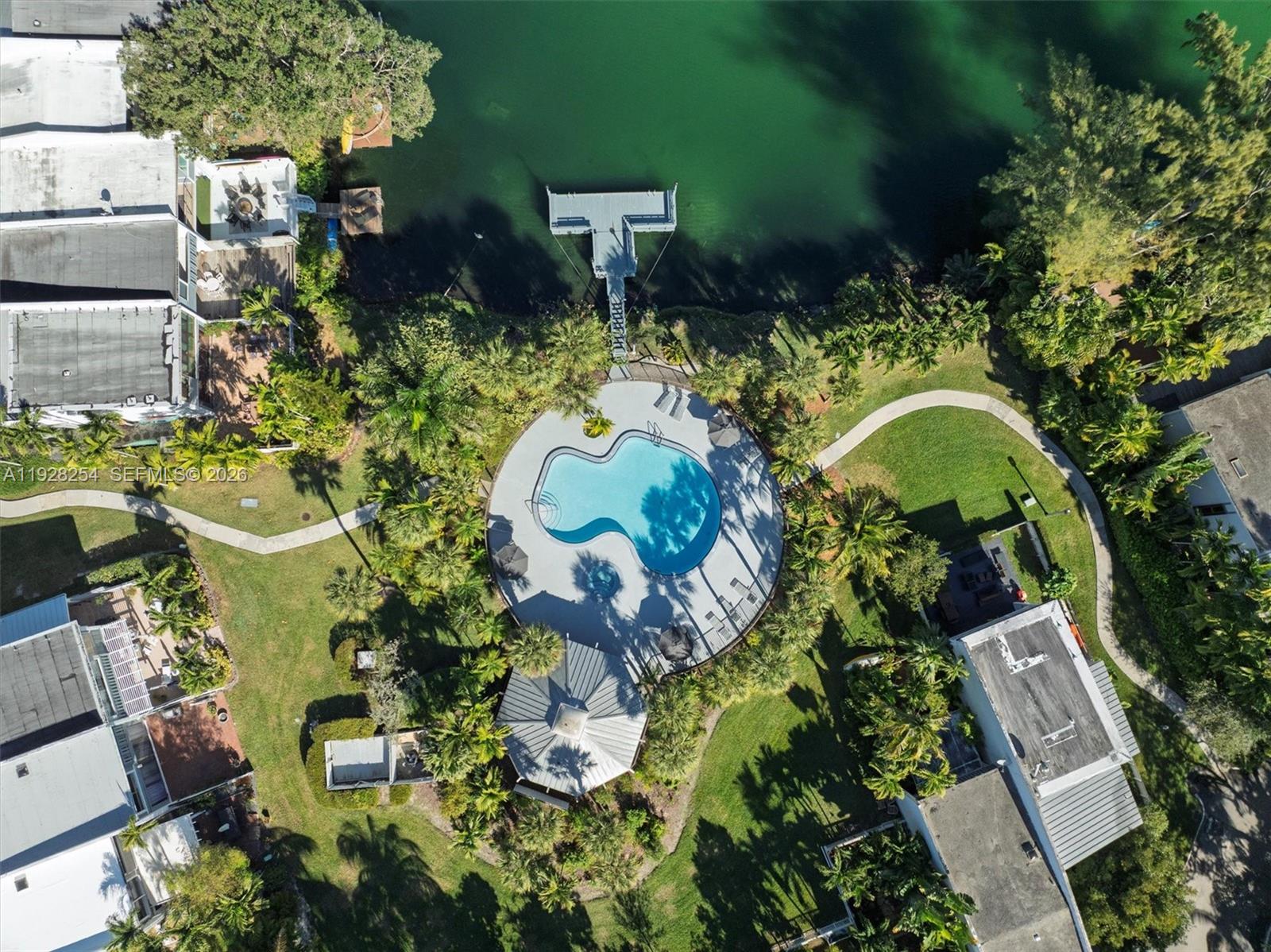 7043 Southwest 53rd Lane Miami, FL 33155 - Photo 39 of 41 an aerial view of a house with a yard and large trees