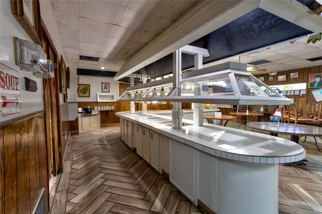a bathroom with double vanity sink and a mirror