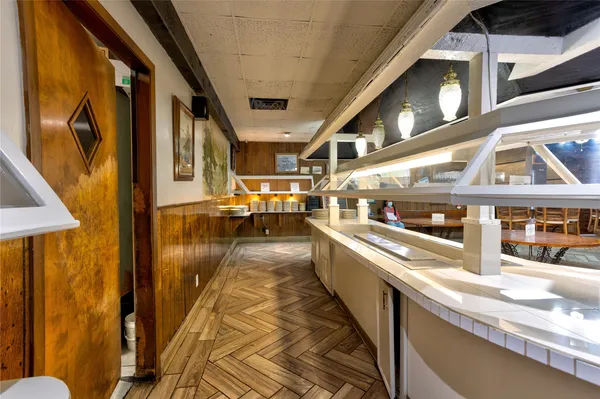 a kitchen with lots of appliances