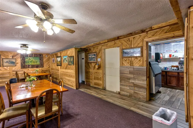 a kitchen with stainless steel appliances granite countertop a sink and stove