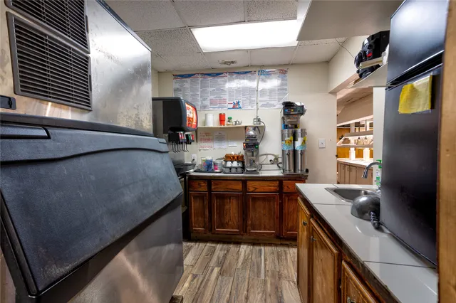 a outdoor space with lots of tables and chairs