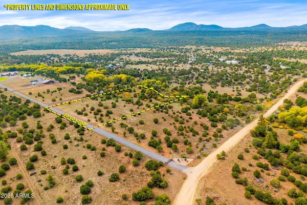 a view of an aerial view of residential houses with outdoor space