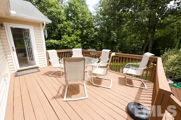 122 Forest Lane Garner, NC 27529 - Photo 15 of 18 a view of a patio on the roof deck