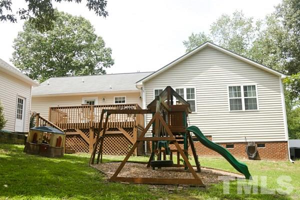 122 Forest Lane Garner, NC 27529 - Photo 16 of 18 a view of a house with backyard