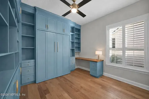 a room with closet and windows
