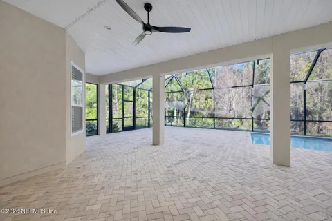 a view of livingroom with furniture and front door