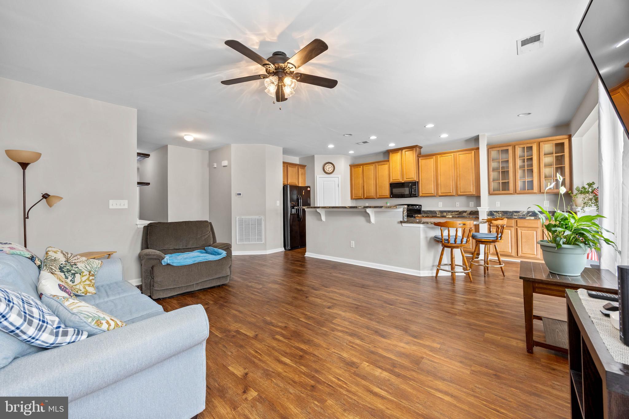 191 Bobbys Branch Road Millsboro, DE 19966 - Photo 18 of 40 a living room with furniture and kitchen view