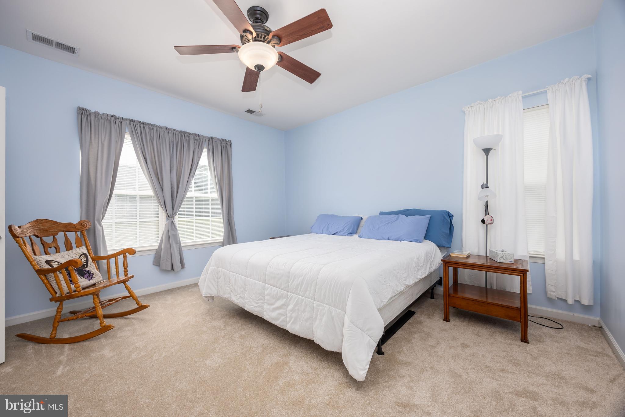 191 Bobbys Branch Road Millsboro, DE 19966 - Photo 19 of 40 a bedroom with a bed chair and window