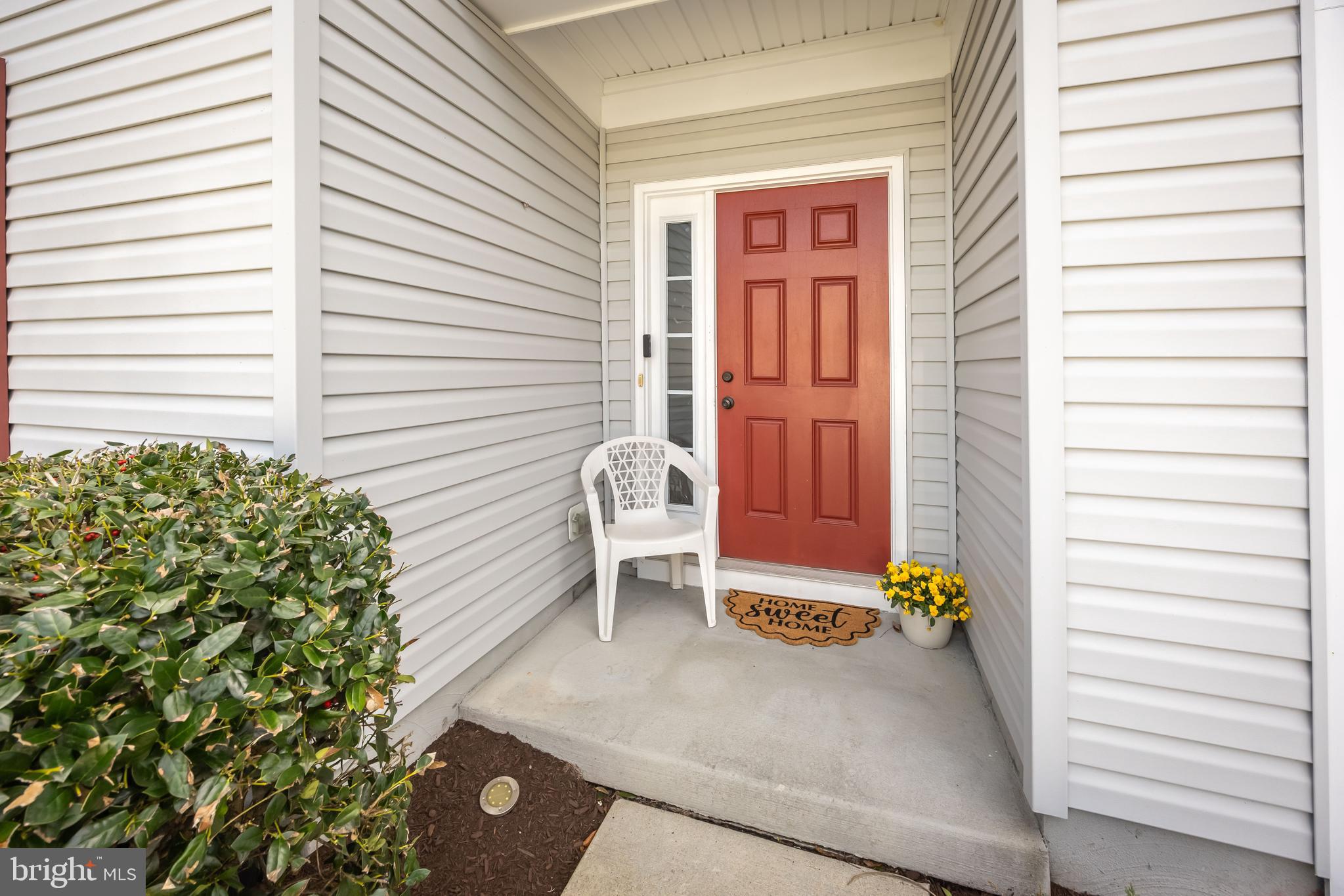191 Bobbys Branch Road Millsboro, DE 19966 - Photo 2 of 40 a view of a porch with a bench