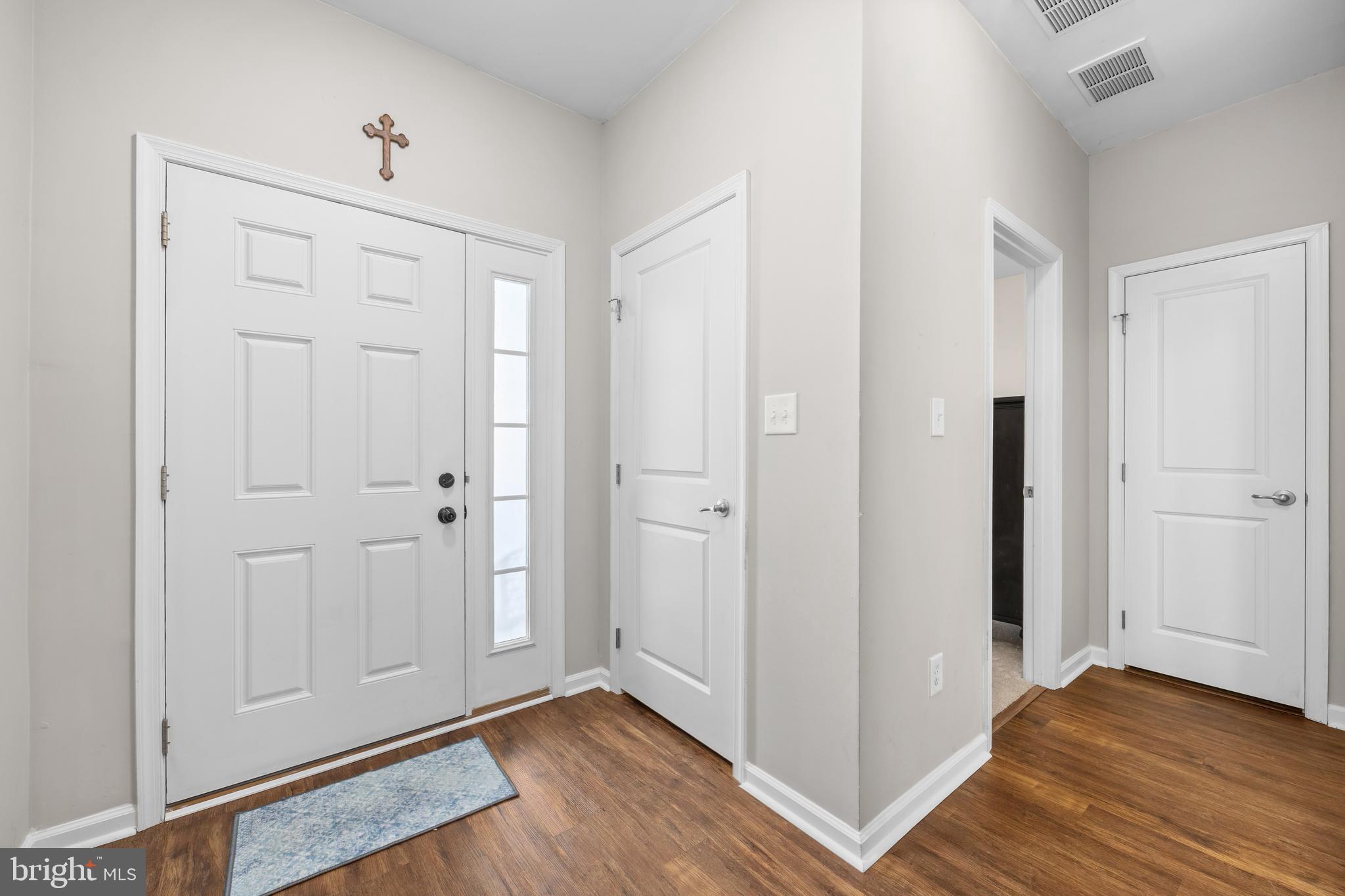 191 Bobbys Branch Road Millsboro, DE 19966 - Photo 3 of 40 a view of empty room with wooden floor