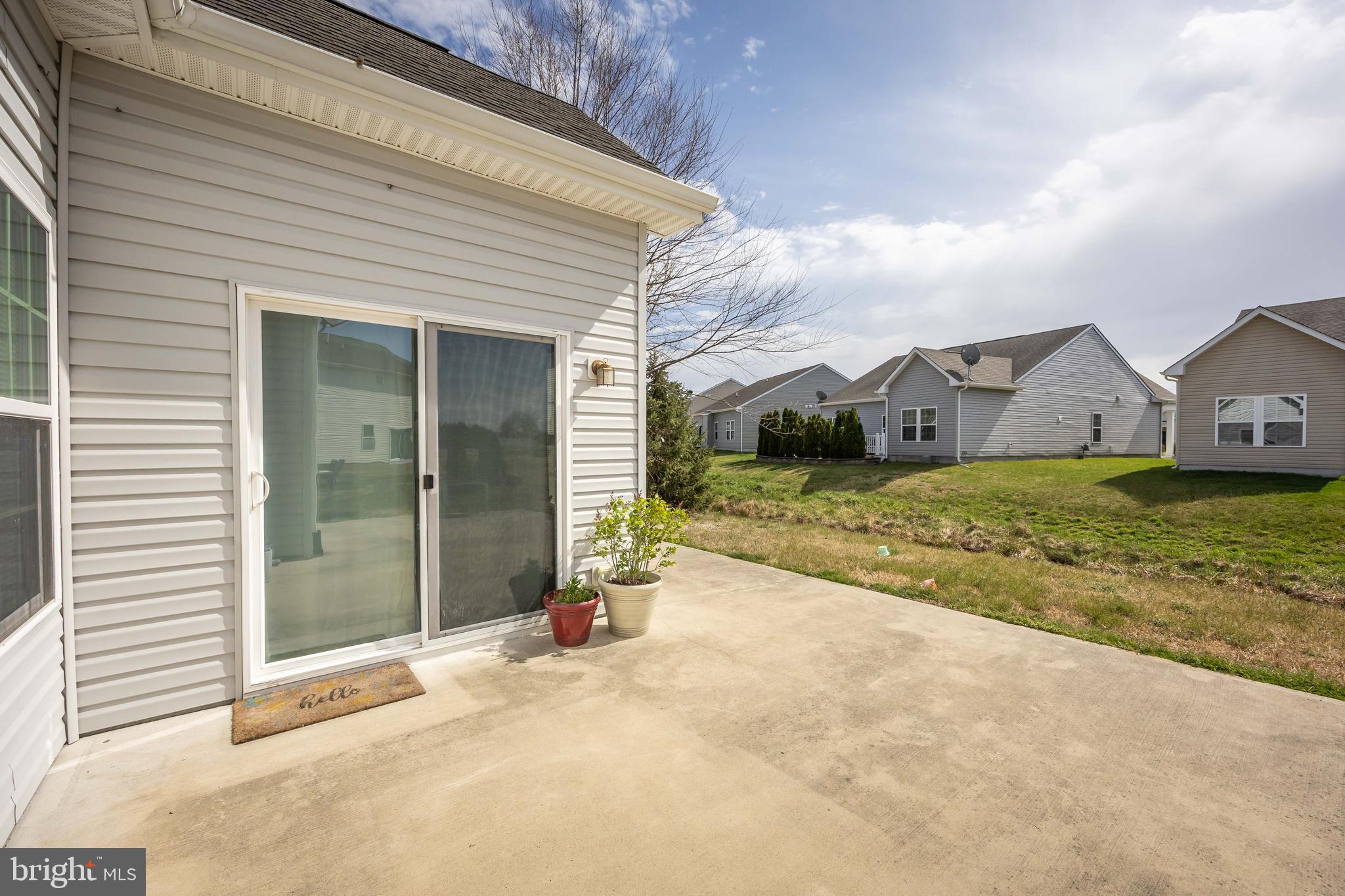 191 Bobbys Branch Road Millsboro, DE 19966 - Photo 35 of 40 a view of a house with backyard and porch