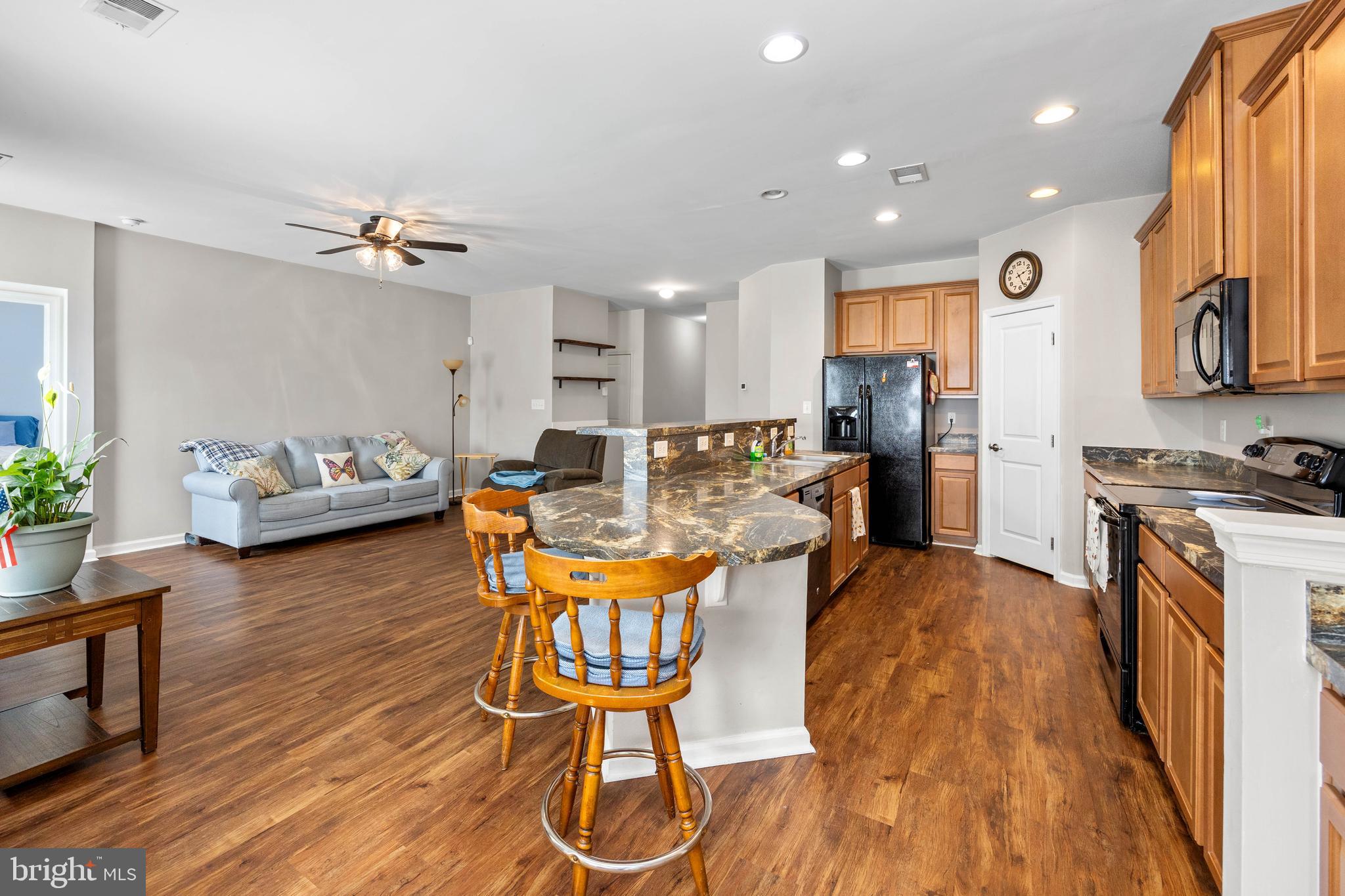 191 Bobbys Branch Road Millsboro, DE 19966 - Photo 7 of 40 a living room with furniture and a wooden floor