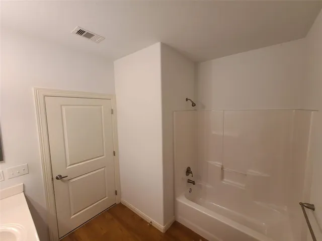 a bathroom with a bathtub