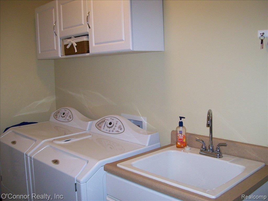 2033 Wadhams Road St. Clair, MI 48079 - Photo 7 of 15 Well Equipped Laundry Room