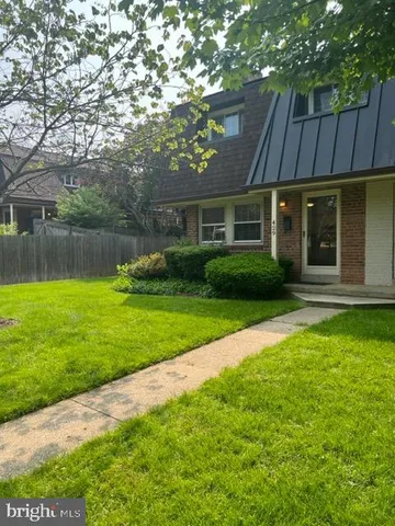 a view of a house with a garden