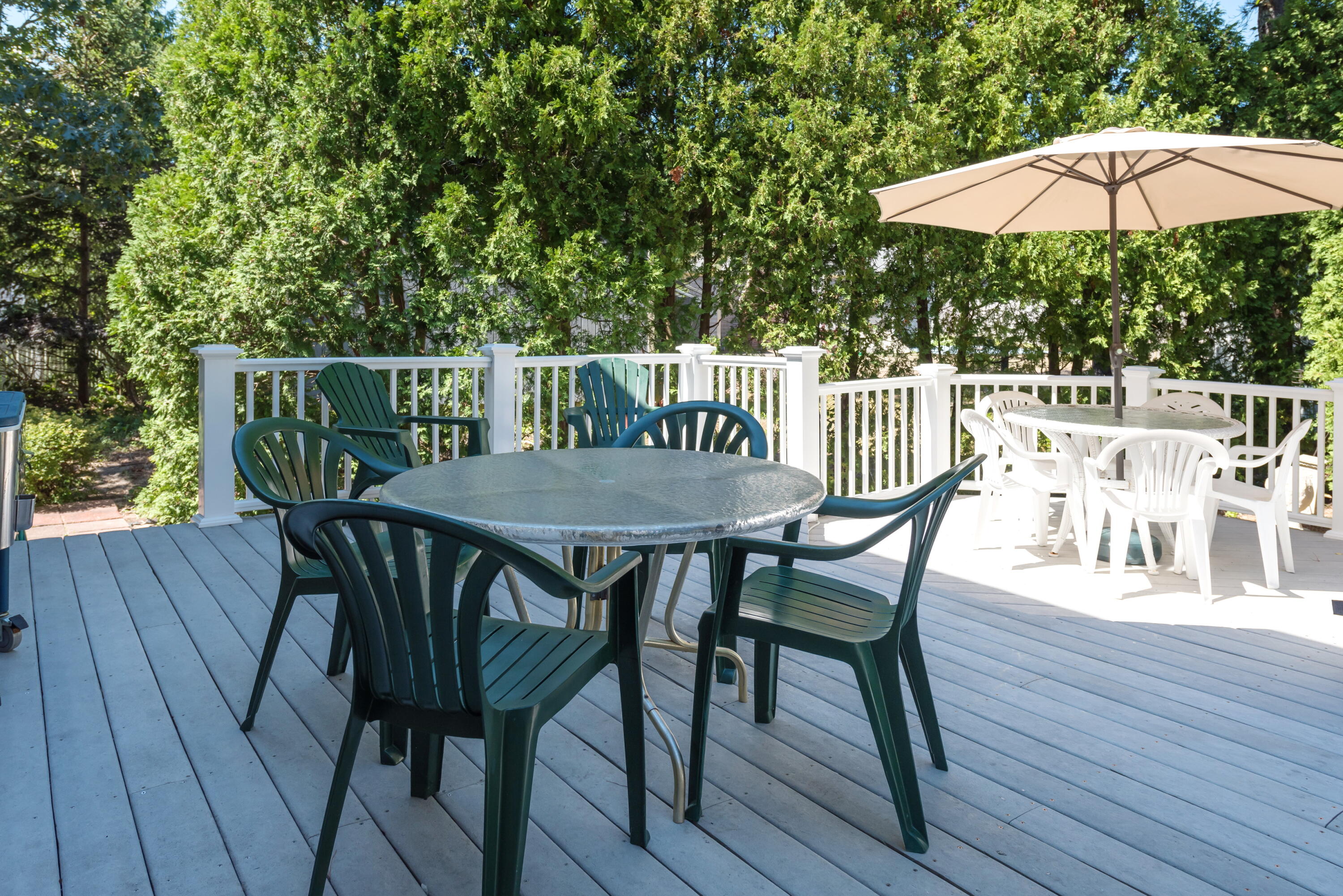 280 Lower County Road Harwich Port, MA 02646 - Photo 14 of 34 a view of a patio of a house with table and chairs