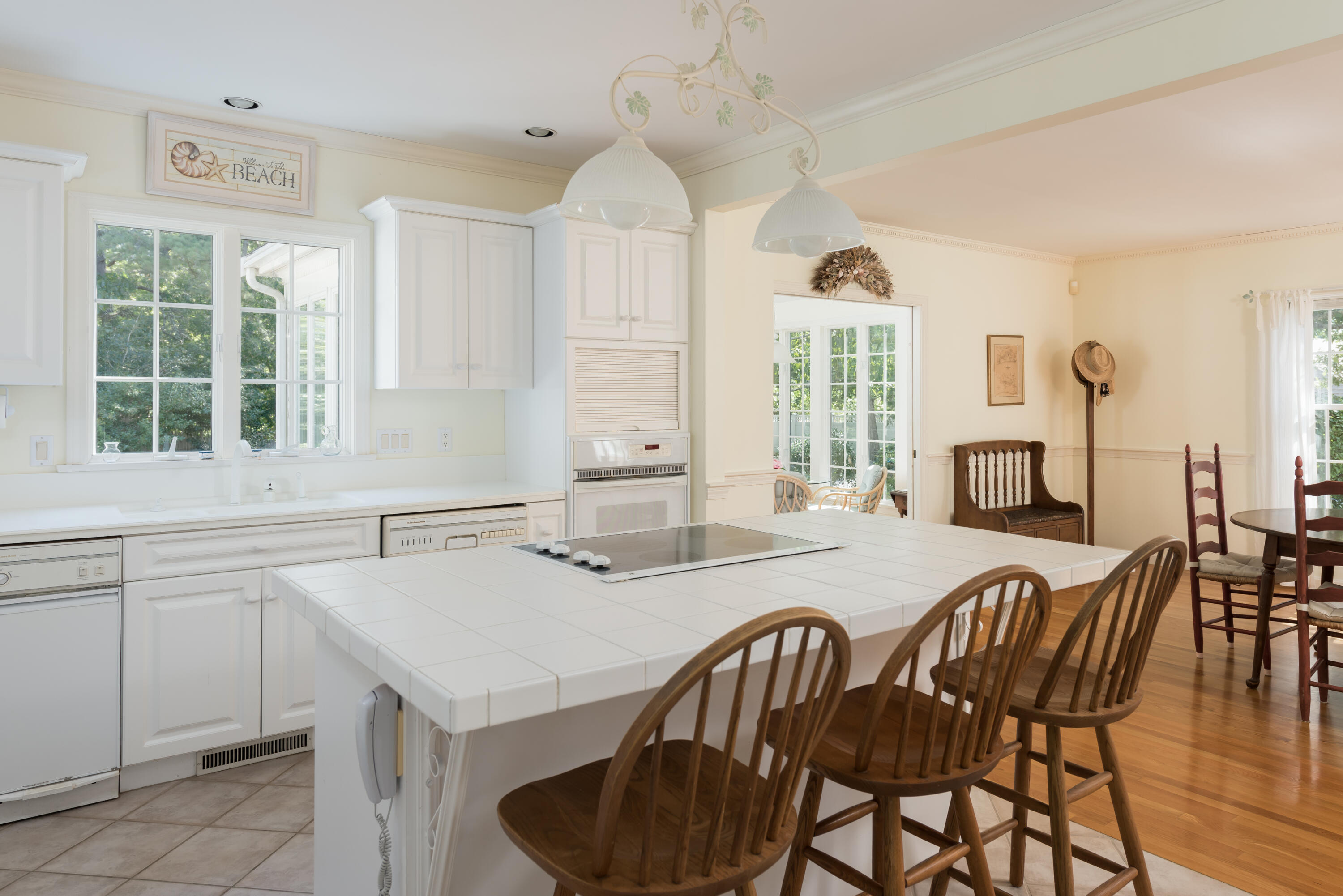 280 Lower County Road Harwich Port, MA 02646 - Photo 16 of 34 a view of a dining room with furniture and window