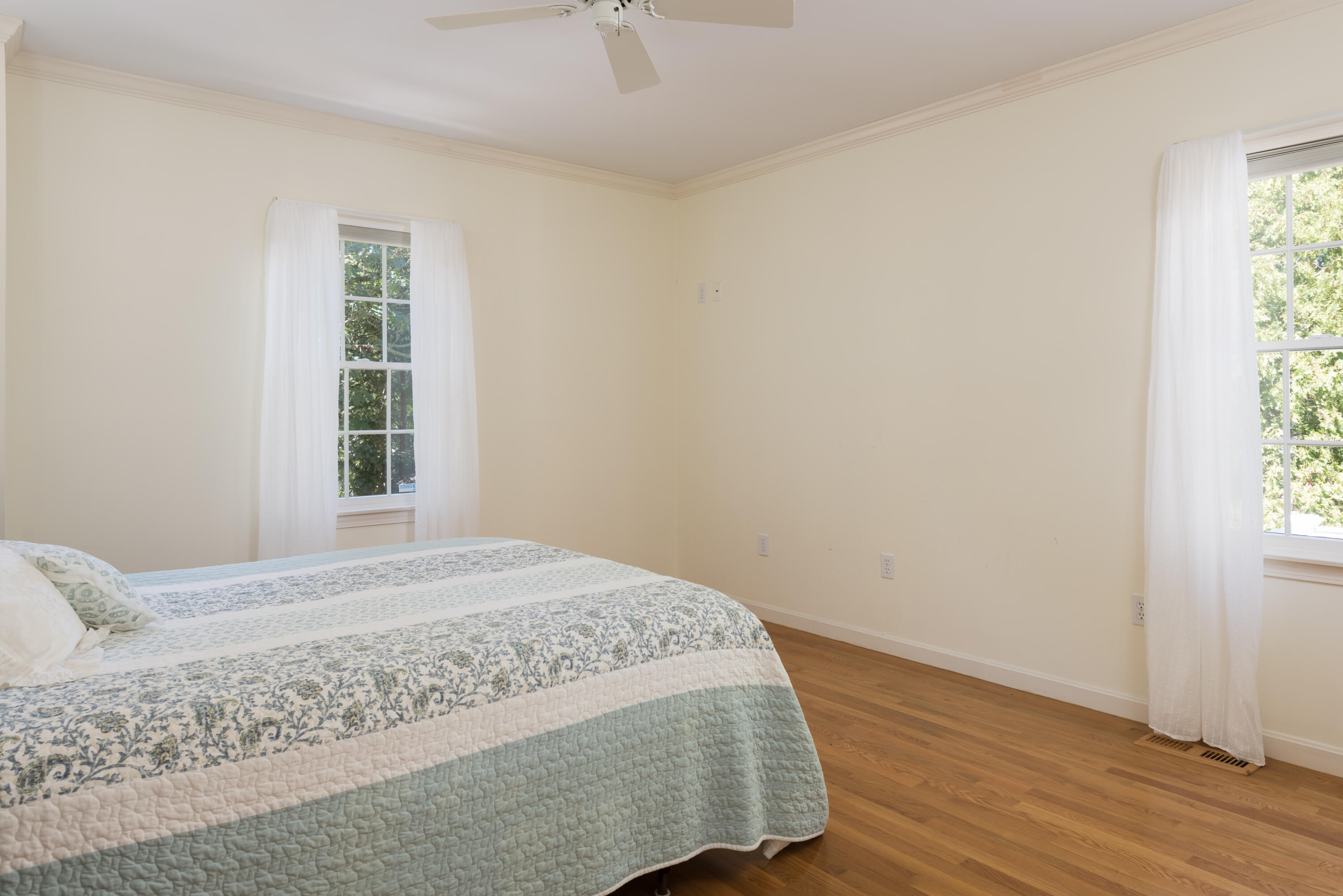 280 Lower County Road Harwich Port, MA 02646 - Photo 18 of 34 a bedroom with a bed and a window