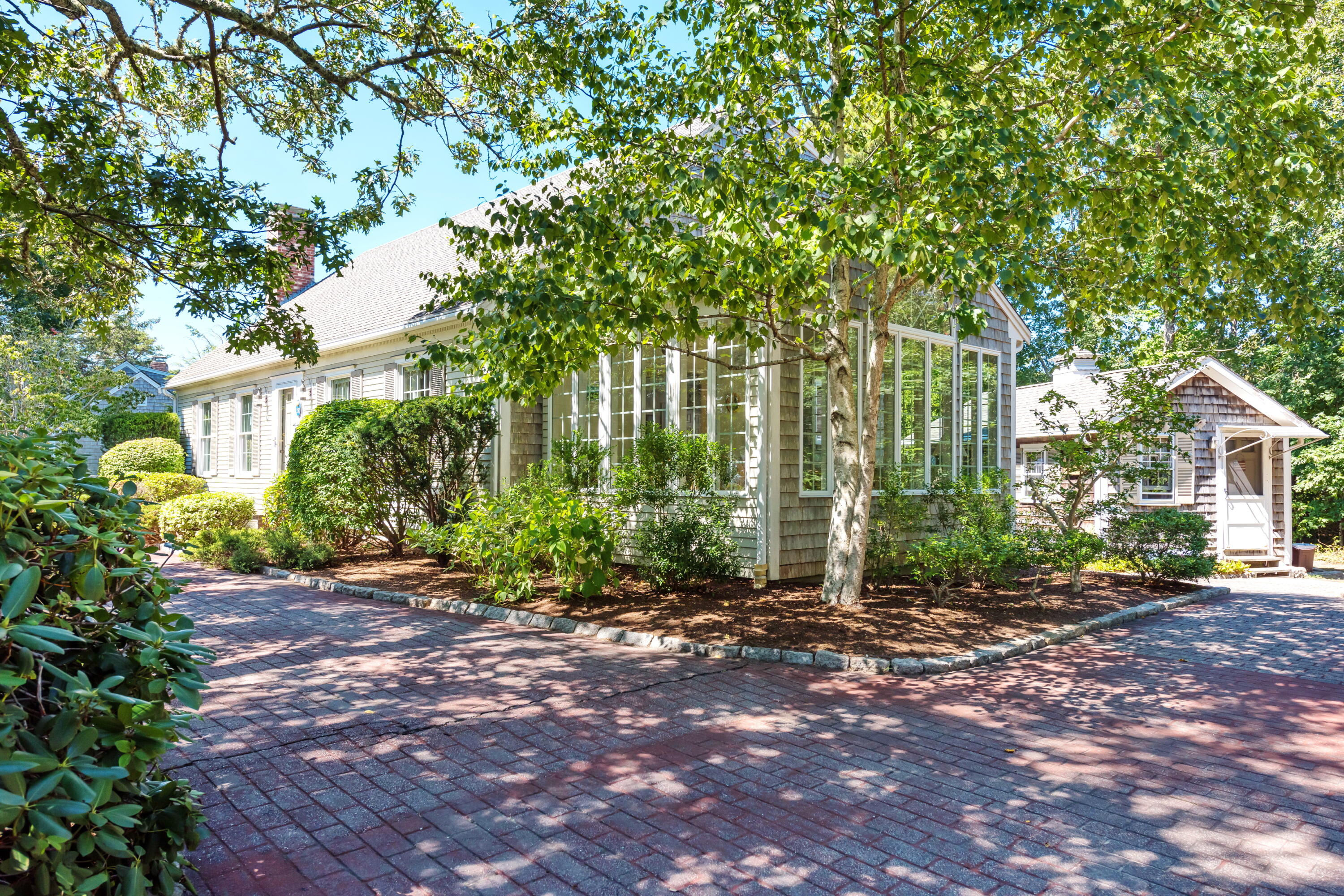 280 Lower County Road Harwich Port, MA 02646 - Photo 2 of 34 a view of a house with a street