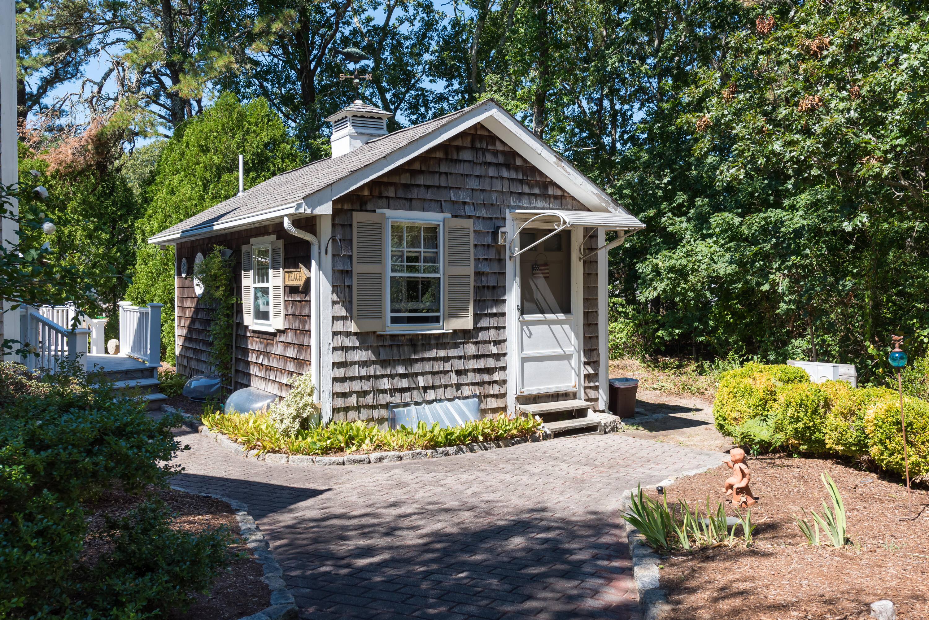 280 Lower County Road Harwich Port, MA 02646 - Photo 30 of 34 a front view of a house with a yard