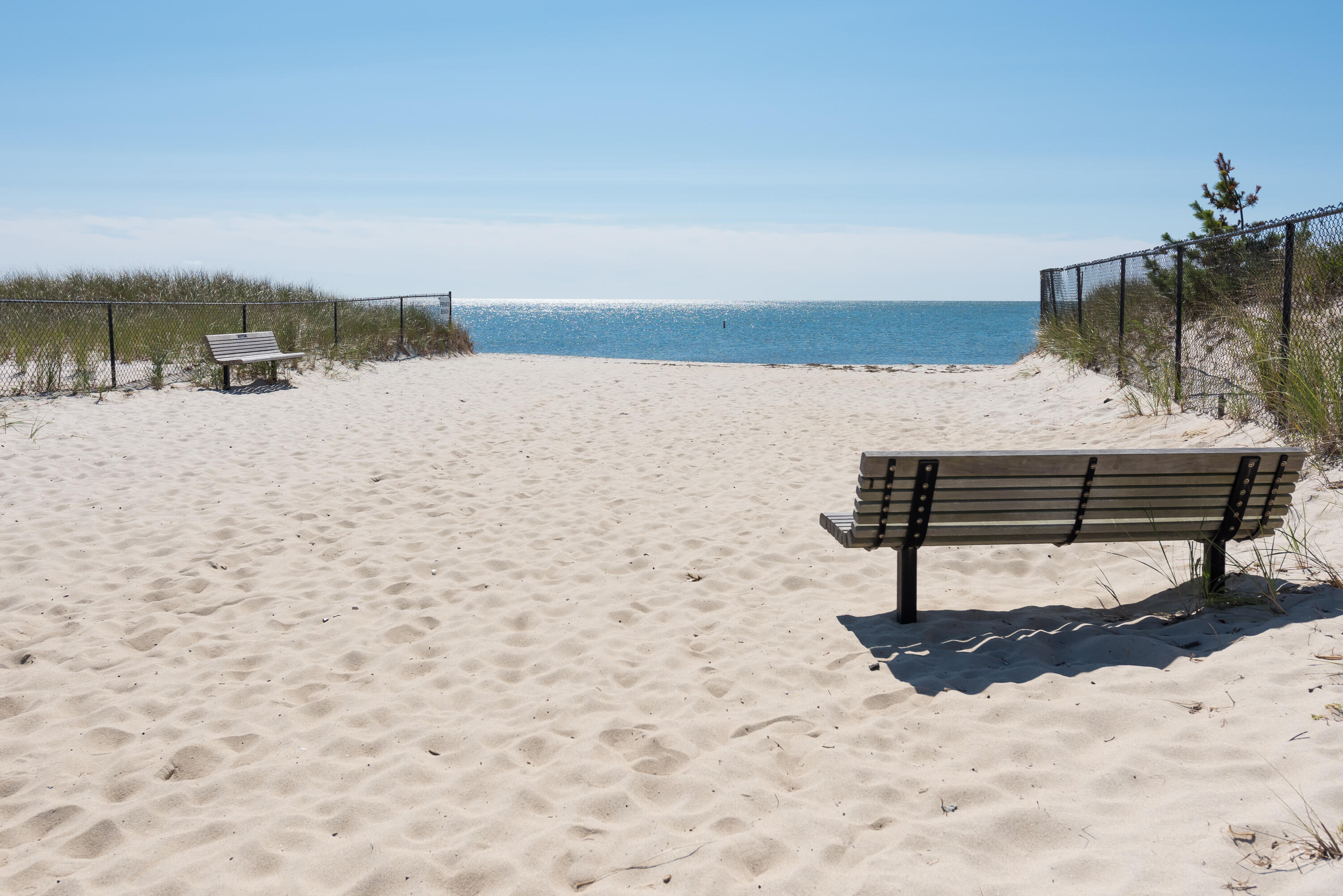 280 Lower County Road Harwich Port, MA 02646 - Photo 4 of 34 a view of a lake with a yard