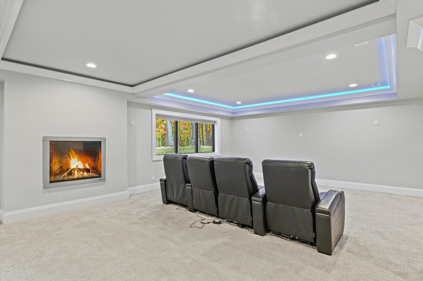 1410 East White Oak Road Mahomet, IL 61853 - Photo 115 of 140 a living room with couches chairs and a flat screen tv