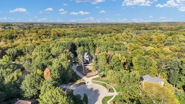 a kitchen with stainless steel appliances granite countertop a sink and a refrigerator