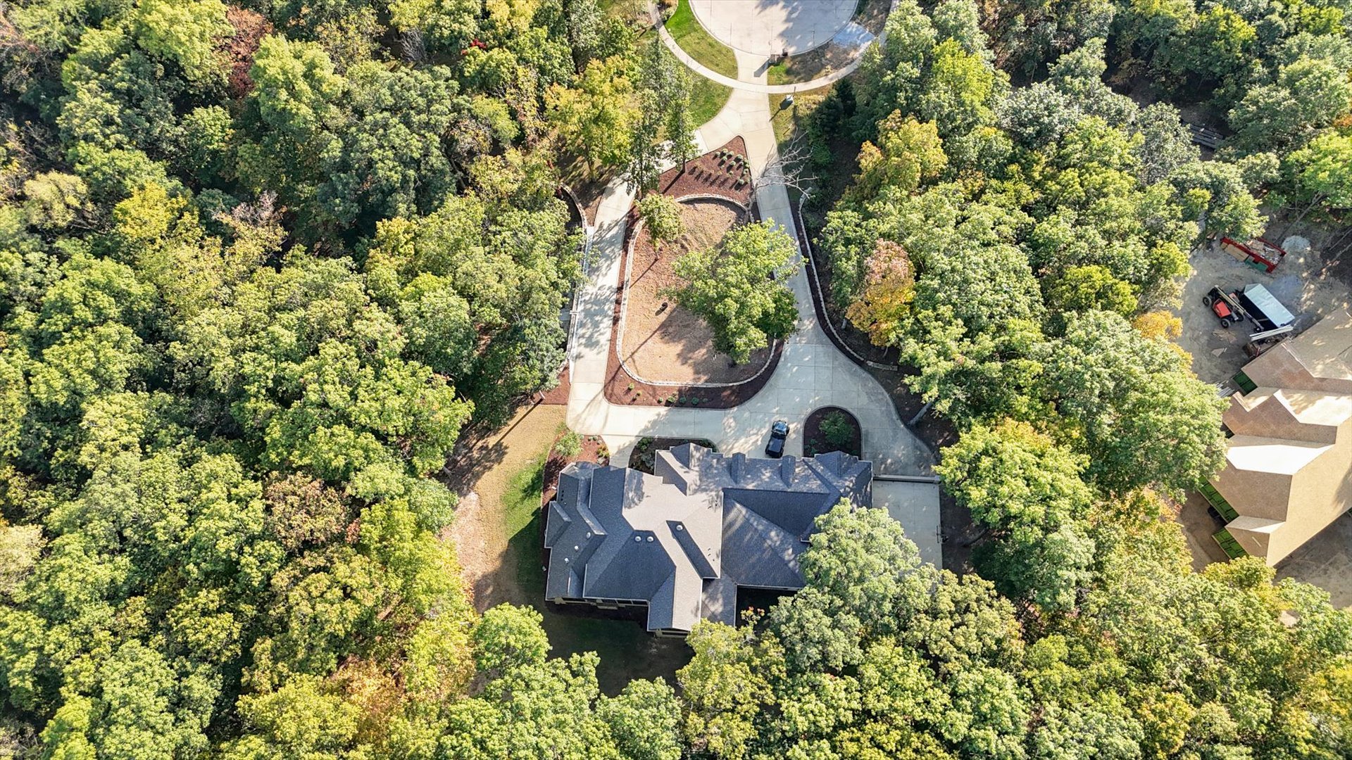 1410 East White Oak Road Mahomet, IL 61853 - Photo 29 of 140 an aerial view of a house with swimming pool and garden