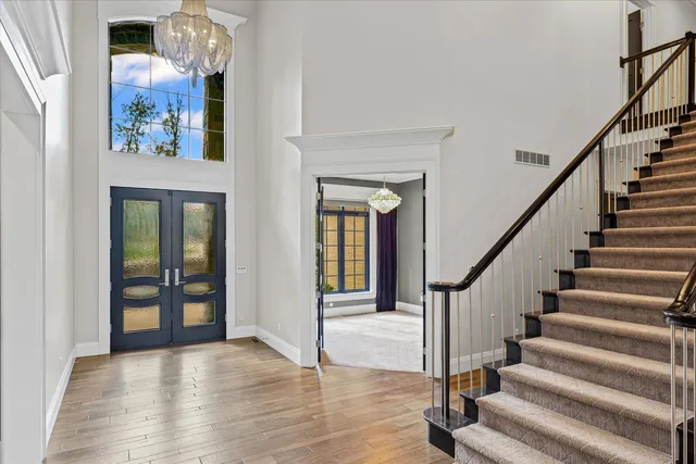 en empty room with large windows and a projector