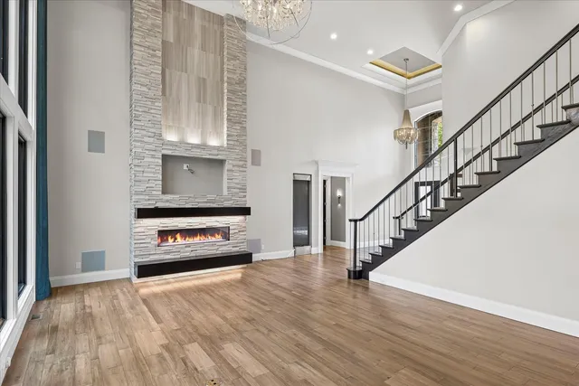 a spacious bathroom with a tub and window