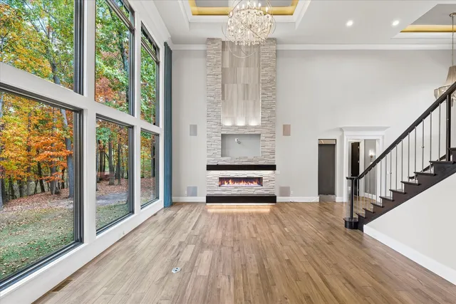 a white bath tub sitting in front of a window