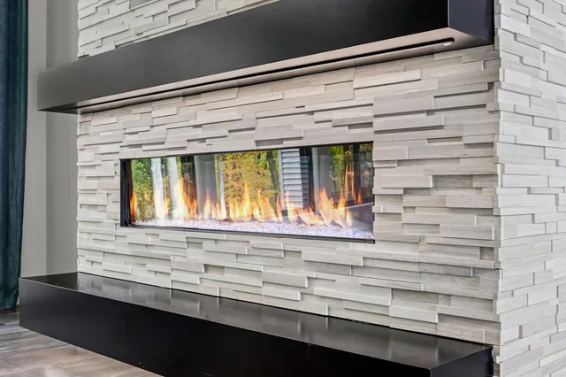 a view of a balcony with wooden floor and outdoor space