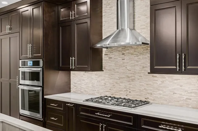 a view of an empty room with closet area