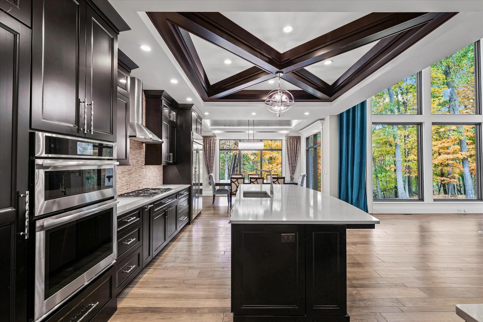 1410 East White Oak Road Mahomet, IL 61853 - Photo 61 of 140 a kitchen with stainless steel appliances granite countertop a stove and a refrigerator