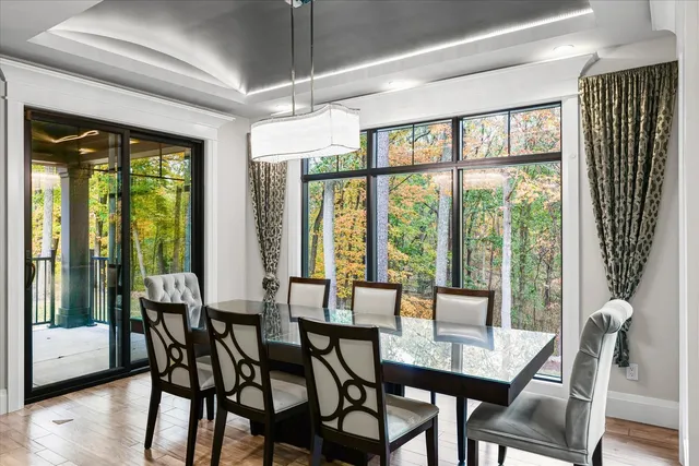 a picture of a bathroom with a shower and a mirror