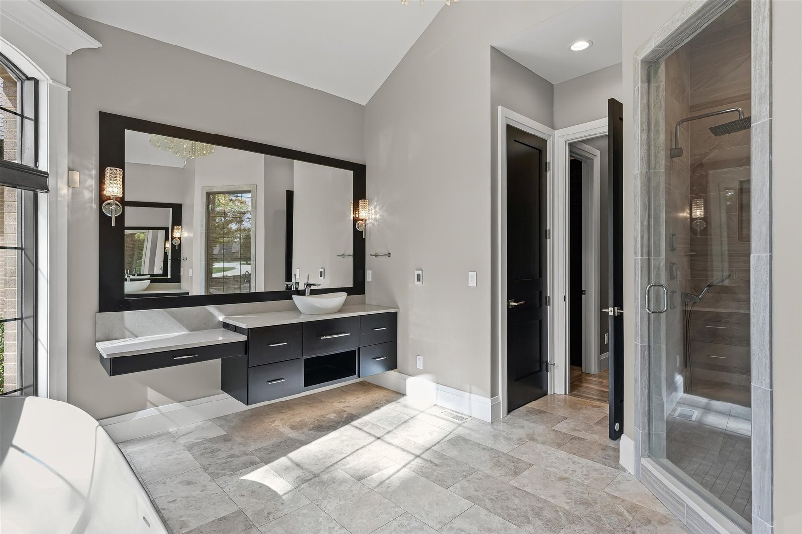 1410 East White Oak Road Mahomet, IL 61853 - Photo 81 of 140 a large bedroom with a large window and a glass door shower