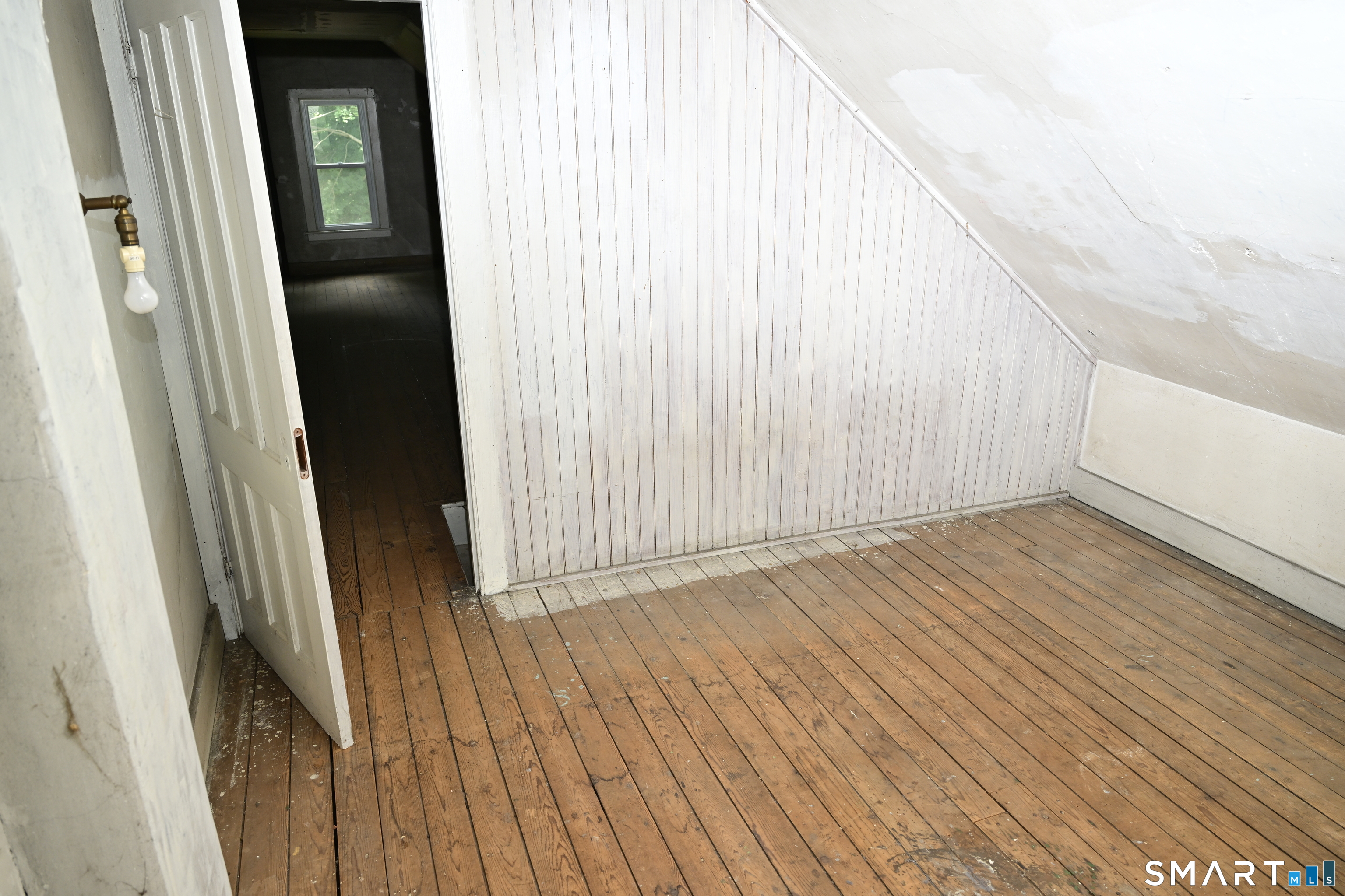 29 Locke Street Ansonia, CT 06401 - Photo 17 of 39 Right side Unit Attic . Lots of Storage in this attic !