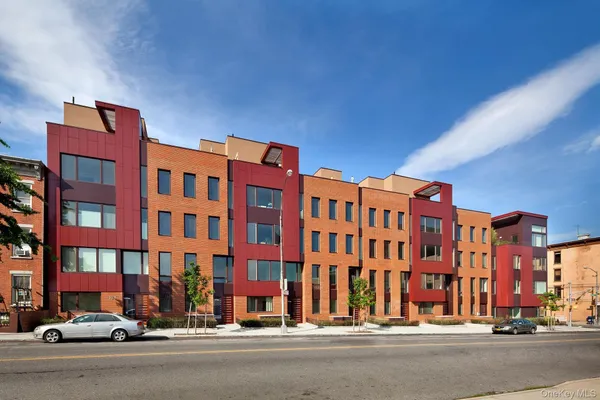 a view of a building and a street