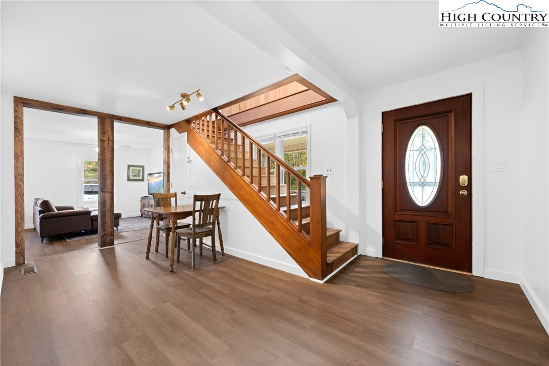 1044 Highway 321 Vilas, NC 28692 - Photo 14 of 47 a view of an entryway with wooden floor and door