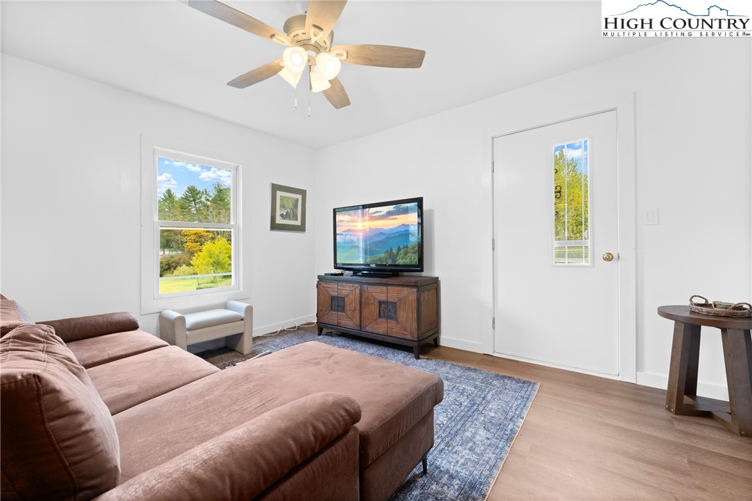 1044 Highway 321 Vilas, NC 28692 - Photo 18 of 47 a bedroom with a bed and a flat screen tv