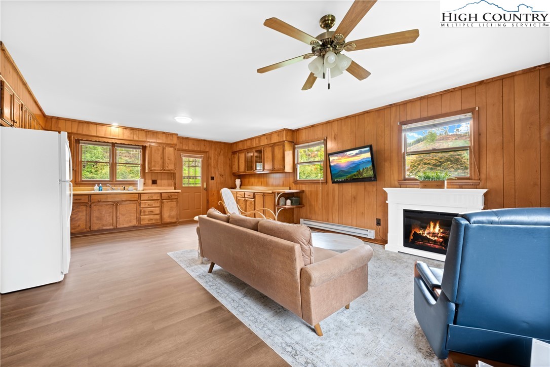 1044 Highway 321 Vilas, NC 28692 - Photo 29 of 47 a living room with furniture and a flat screen tv
