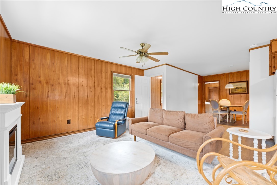 1044 Highway 321 Vilas, NC 28692 - Photo 31 of 47 a living room with furniture and a large window