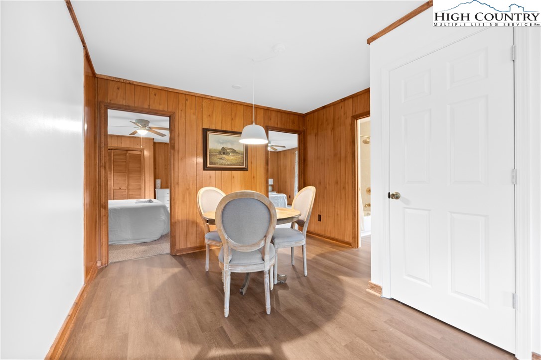 1044 Highway 321 Vilas, NC 28692 - Photo 37 of 47 a dining room with furniture and wooden floor