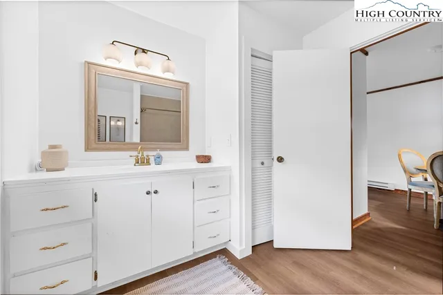 a view of a hallway with washer and dryer