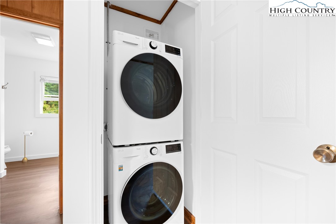 1044 Highway 321 Vilas, NC 28692 - Photo 45 of 47 a view of a hallway with washer and dryer