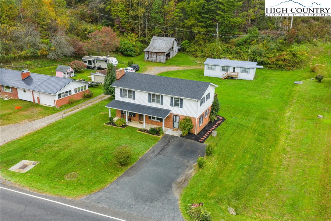 1044 Highway 321 Vilas, NC 28692 - Photo 5 of 47 an aerial view of a house with a garden