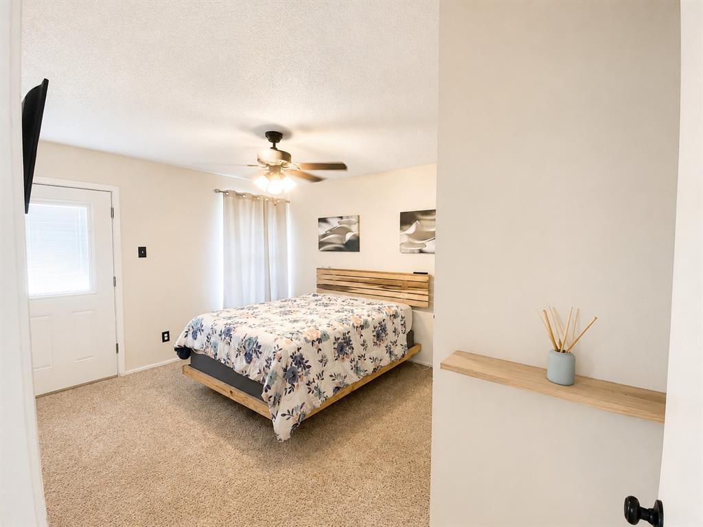 404 Old Mansfield Road Keene, TX 76059 - Photo 10 of 33 Primary Bedroom from hallway